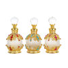 Fancy Metal Gold Empty Zinc Alloy Crystal Luxury Portable Arabic Perfume Bottle Wholesale