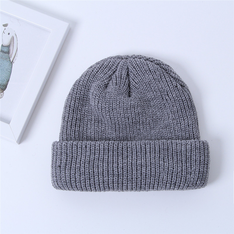 Wholesale Custom Knit Slouchy Merino Wool Cheap Beanie Hat with Custom Leather Label 